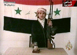 The Iraqi suicide bomber, Warda Jamil, before driving her car in a suicide mission, North West of Baghdad  (aljazeera.net, 4/5/03). 