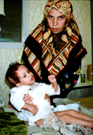 A young child with cancer. Cancer is the death verdict for this child because of inavailbity of chemotherapy treatment. Qadissiya Hospital. (Photo: Rick McDowell ) 