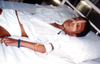 Ali Anba 11 years , initially suffered a respiratory infection, with no antibiotics available it developed into end stage pneumonia. Qadissiya Hospital. (Photo: Rick McDowell ) 