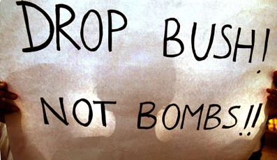 The shadow of a protester falls on an anti-war banner during a demonstration in Bombay on Monday. About 1,000 protesters shouted anti-US and anti-war slogans as they marched through the streets of Bombay. (Alquds Alarabi, Arab News, 1/28/03) 